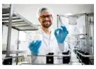 What is the Hold Time for Instruments Exposed to C. Diff Spores Before Manual Cleaning Begins?
